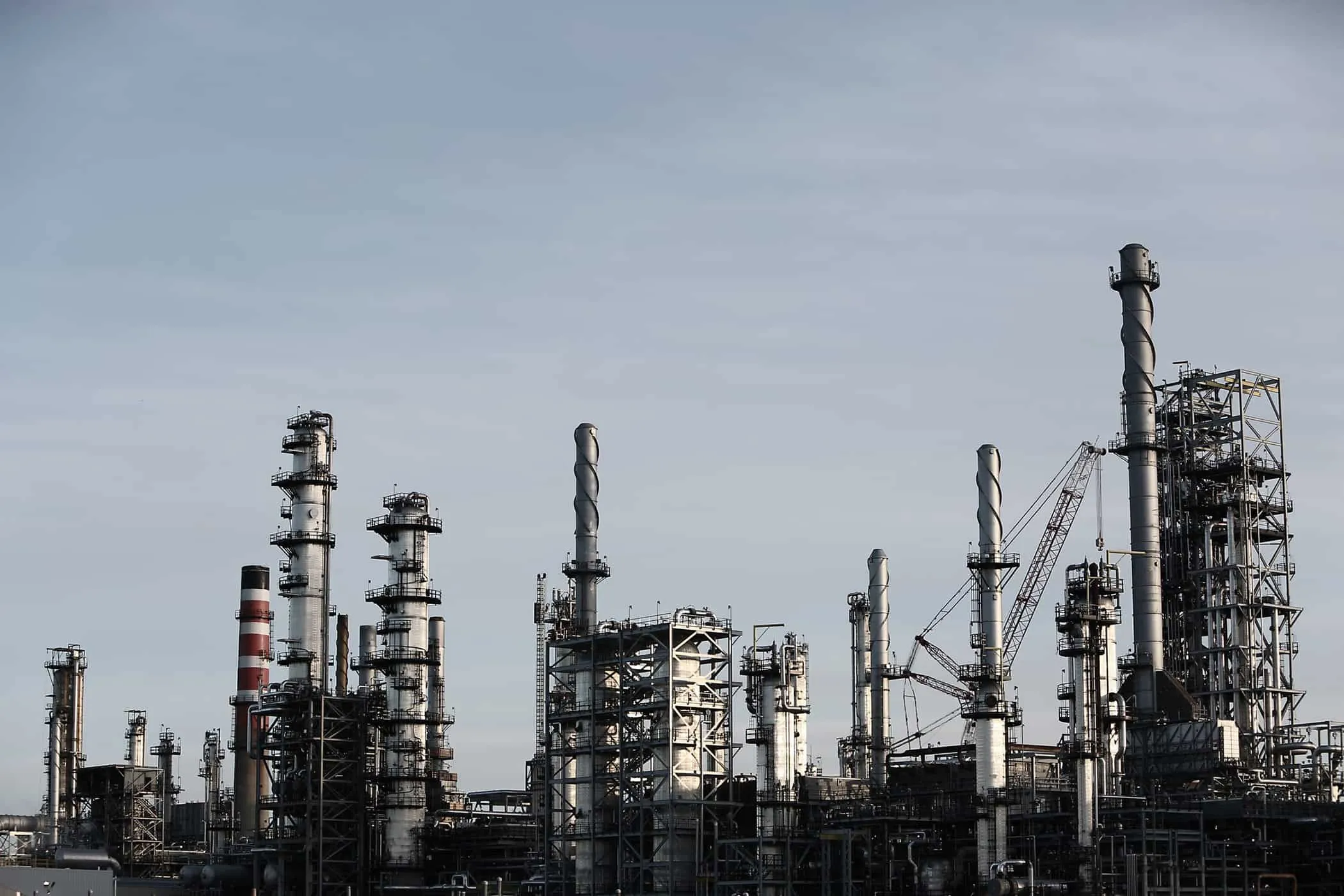 Cyanide Technology Consulting GmbH - production, engineering, and operation of cyanide plants (NaCN & HCN) - This image shows a complex industrial piping system, likely part of a water treatment, chemical processing, or manufacturing plant. 